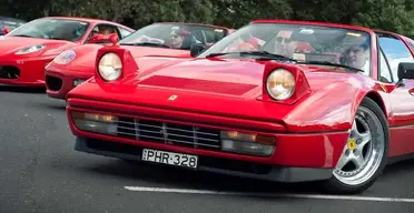 Ferrari-328-GTS---Prancing-Horse-990x511.webp